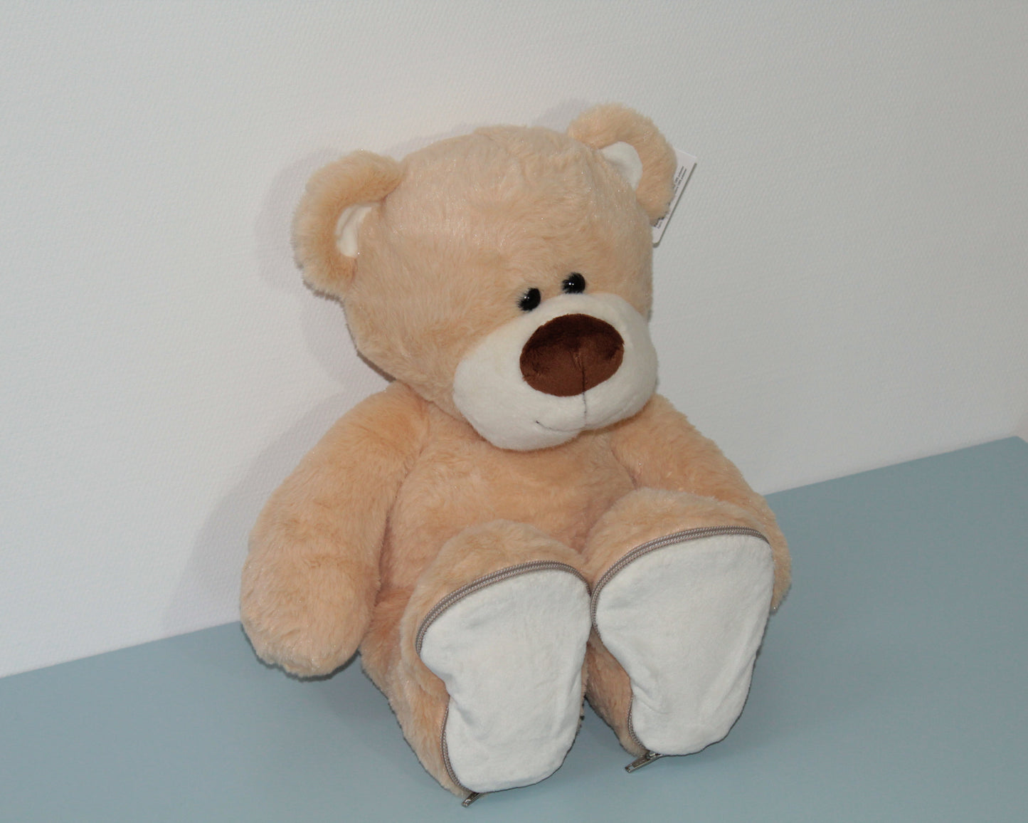 Knuffel met gepersonaliseerde voetjes