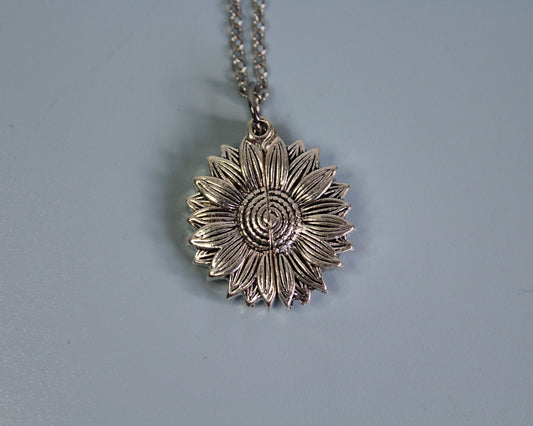 Ketting bloem met verborgen hart